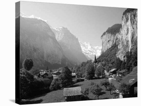 Lauterbrunnen and Staubbach Falls, Jungfrau Region, Swiss Alps, Switzerland, Europe-Roy Rainford-Stretched Canvas