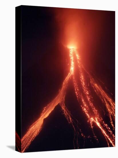 Lava Cascades Down the Slopes of Mayon Volcano in a Continuing Mild Eruption at Dusk, Philippines-null-Stretched Canvas