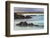 Lava rocks along tranquil shoreline of San Cristobal Island, Galapagos, Ecuador.-Adam Jones-Framed Photographic Print