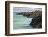 Lava rocks along tranquil shoreline of San Cristobal Island, Galapagos, Ecuador.-Adam Jones-Framed Photographic Print