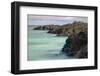 Lava rocks along tranquil shoreline of San Cristobal Island, Galapagos, Ecuador.-Adam Jones-Framed Photographic Print