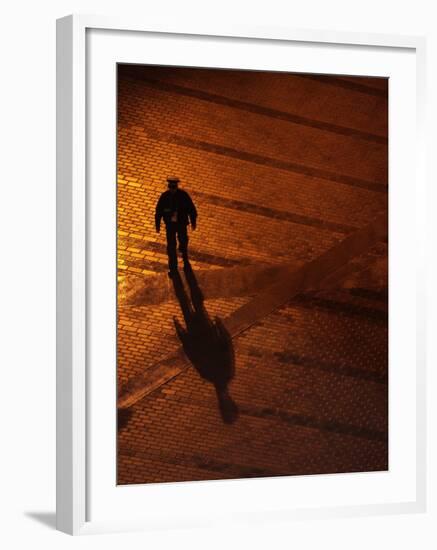 Law Enforcement Officer Patrols before the Opening Ceremony for the Vancouver 2010 Olympics-null-Framed Photographic Print