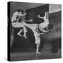 Law Student Gojuro Harada Uses Right Foot on the stomach to ward off attack of economics student-John Florea-Stretched Canvas