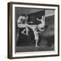 Law Student Gojuro Harada Uses Right Foot on the stomach to ward off attack of economics student-John Florea-Framed Photographic Print