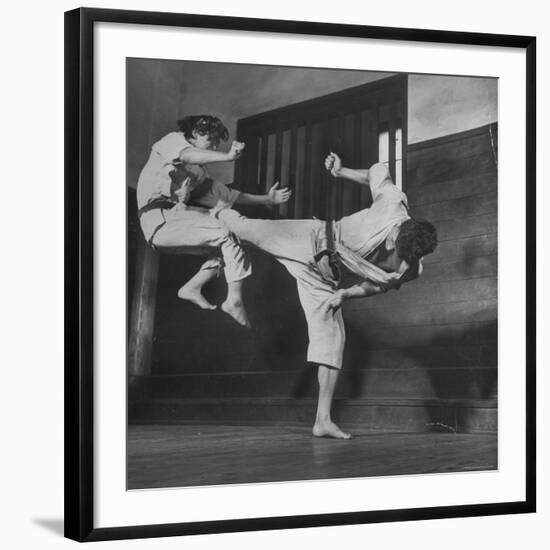 Law Student Gojuro Harada Uses Right Foot on the stomach to ward off attack of economics student-John Florea-Framed Photographic Print