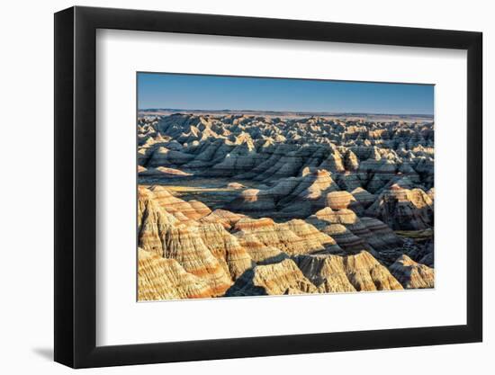 Layers of hoodoo peaks stretching into a flat landscape at the horizon.-Sheila Haddad-Framed Photographic Print