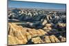 Layers of hoodoo peaks stretching into a flat landscape at the horizon.-Sheila Haddad-Mounted Photographic Print