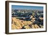 Layers of hoodoo peaks stretching into a flat landscape at the horizon.-Sheila Haddad-Framed Photographic Print