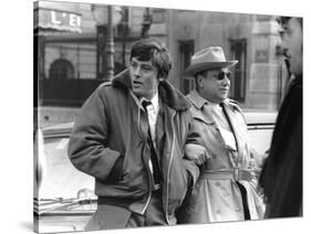 Le realisateur Jean-Pierre Melville and Alain Delon sur le tournage du film Un Flic, 1972 (b/w phot-null-Stretched Canvas