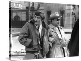 Le realisateur Jean-Pierre Melville and Alain Delon sur le tournage du film Un Flic, 1972 (b/w phot-null-Stretched Canvas