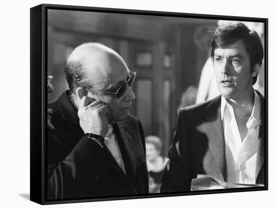 Le realisateur Jean-Pierre Melville and Alain Delon sur le tournage du film Un Flic, 1972 (b/w phot-null-Framed Stretched Canvas