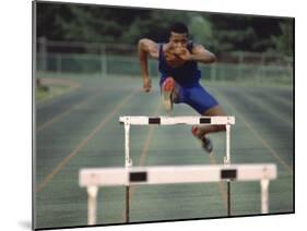 Leaping Over Hurdles-null-Mounted Photographic Print