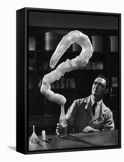 Leaping Rubber Explosively from Butadiene Gas in Bottle as Demonstrated by M.I.T.'s Dr. A. Morton-W^ Eugene Smith-Framed Stretched Canvas