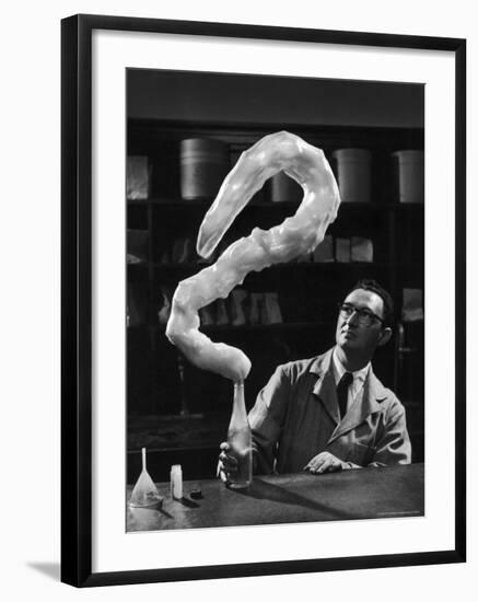 Leaping Rubber Explosively from Butadiene Gas in Bottle as Demonstrated by M.I.T.'s Dr. A. Morton-W^ Eugene Smith-Framed Photographic Print