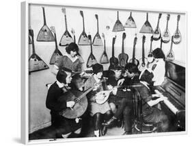 Learning the Balalaika-null-Framed Photographic Print