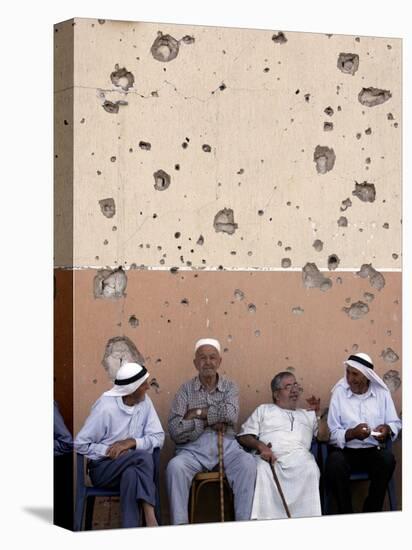 Lebanese Residents Rest in Front of a Wall-null-Stretched Canvas