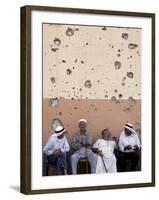 Lebanese Residents Rest in Front of a Wall-null-Framed Photographic Print