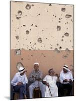 Lebanese Residents Rest in Front of a Wall-null-Mounted Photographic Print