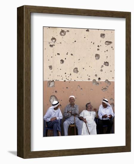 Lebanese Residents Rest in Front of a Wall-null-Framed Photographic Print