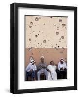 Lebanese Residents Rest in Front of a Wall-null-Framed Photographic Print