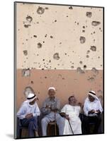 Lebanese Residents Rest in Front of a Wall-null-Mounted Photographic Print