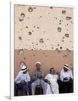 Lebanese Residents Rest in Front of a Wall-null-Framed Photographic Print