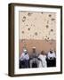 Lebanese Residents Rest in Front of a Wall-null-Framed Photographic Print