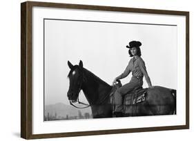 Lee Archer, 24, Riding a Horse at O.B. Llyod Stables in Scottsdale, Arizona, October 1960-Allan Grant-Framed Photographic Print