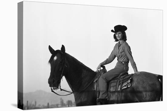 Lee Archer, 24, Riding a Horse at O.B. Llyod Stables in Scottsdale, Arizona, October 1960-Allan Grant-Stretched Canvas