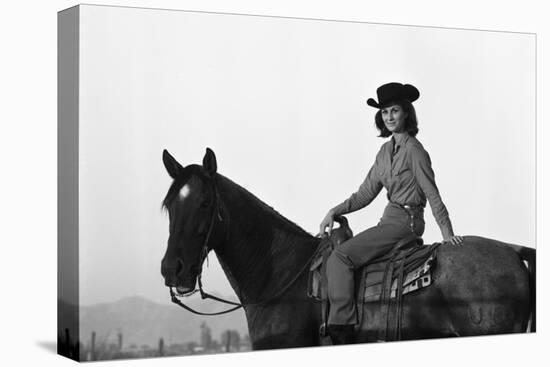 Lee Archer, 24, Riding a Horse at O.B. Llyod Stables in Scottsdale, Arizona, October 1960-Allan Grant-Stretched Canvas