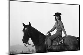 Lee Archer, 24, Riding a Horse at O.B. Llyod Stables in Scottsdale, Arizona, October 1960-Allan Grant-Mounted Photographic Print