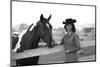 Lee Archer, 24, Riding a Horse at O.B. Llyod Stables in Scottsdale, Arizona, October 1960-Allan Grant-Mounted Photographic Print