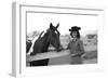 Lee Archer, 24, Riding a Horse at O.B. Llyod Stables in Scottsdale, Arizona, October 1960-Allan Grant-Framed Photographic Print