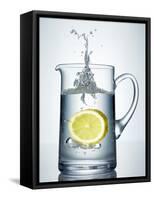 Lemon Falling into Jug of Water-Petr Gross-Framed Stretched Canvas