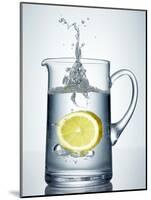 Lemon Falling into Jug of Water-Petr Gross-Mounted Photographic Print