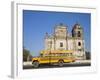 Leon, American Yellow Bluebird Bus Driving Past San Juan Church, Nicaragua-Jane Sweeney-Framed Photographic Print