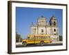 Leon, American Yellow Bluebird Bus Driving Past San Juan Church, Nicaragua-Jane Sweeney-Framed Photographic Print