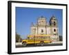 Leon, American Yellow Bluebird Bus Driving Past San Juan Church, Nicaragua-Jane Sweeney-Framed Photographic Print