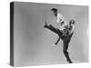 Leon Ames and Willa Mae Ricker Demonstrating a Step of the Lindy Hop-Gjon Mili-Stretched Canvas