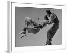 Leon James and Willa Mae Ricker Demonstrating a Step of the Lindy Hop-Gjon Mili-Framed Premium Photographic Print