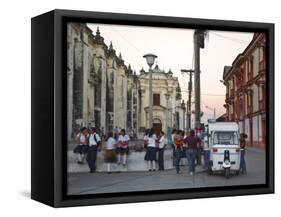Leon, Schoolchildren Sitting on Wall of Leon Cathedral, known as Basilicade La Asuncion, Nicaragua-Jane Sweeney-Framed Stretched Canvas
