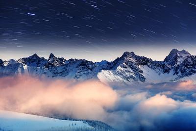 The Milky Way over the Winter Mountains Landscape. Europe. Creative Collage. Beauty World.
