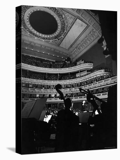 Leopold Stokowski Conducting the New York Philharmonic Orchestra in Performance at Carnegie Hall-Gjon Mili-Stretched Canvas