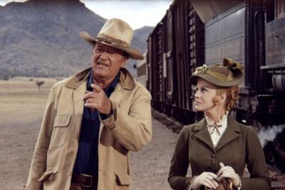 https://imgc.allpostersimages.com/img/posters/les-voleurs-by-trains-the-train-robbers-by-burtkennedy-with-john-wayne-and-ann-margret-1973-photo_u-L-Q1C1JYC0.jpg?artPerspective=n