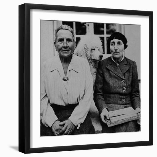 Lesbian Authors Gertrude Stein and Alice B. Toklas with their Poodle Basket II-Carl Mydans-Framed Premium Photographic Print