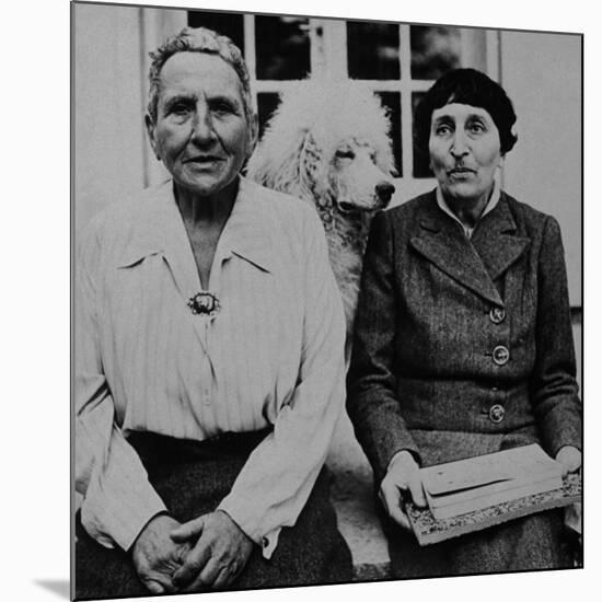 Lesbian Authors Gertrude Stein and Alice B. Toklas with their Poodle Basket II-Carl Mydans-Mounted Premium Photographic Print