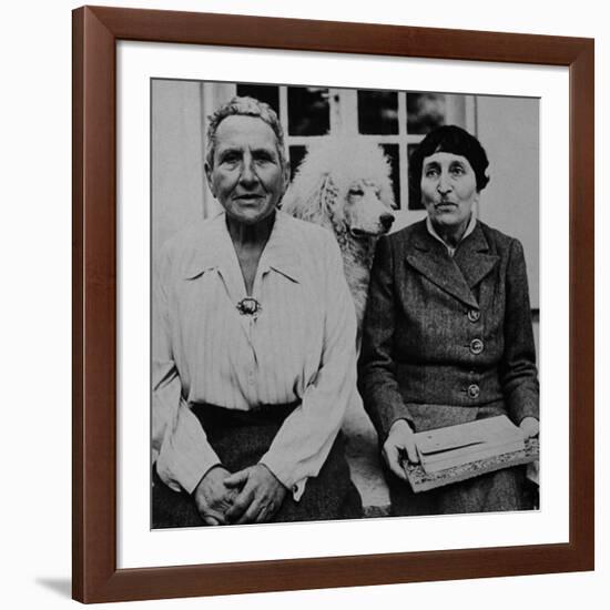 Lesbian Authors Gertrude Stein and Alice B. Toklas with their Poodle Basket II-Carl Mydans-Framed Premium Photographic Print