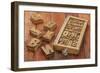 Letterpress Wood Type Blocks in a Typesetter Drawer against Rustic Red Barn Wood-PixelsAway-Framed Art Print