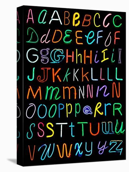 Letters Of The Alphabet Made From Neon Signs-Karimala-Stretched Canvas