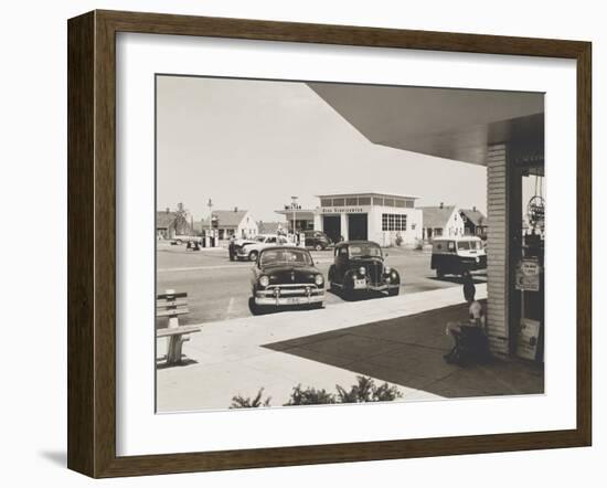 Levittown, N.Y. Corner Store across the Street from a Gas Station-null-Framed Photo